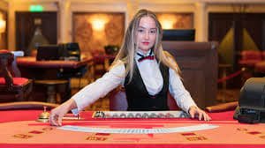 taipan99 live casino table with multiple camera feeds and dealer